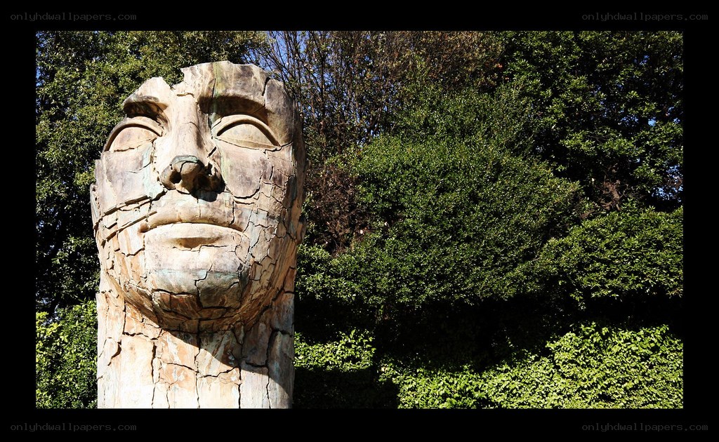 cracked stone face sculpture