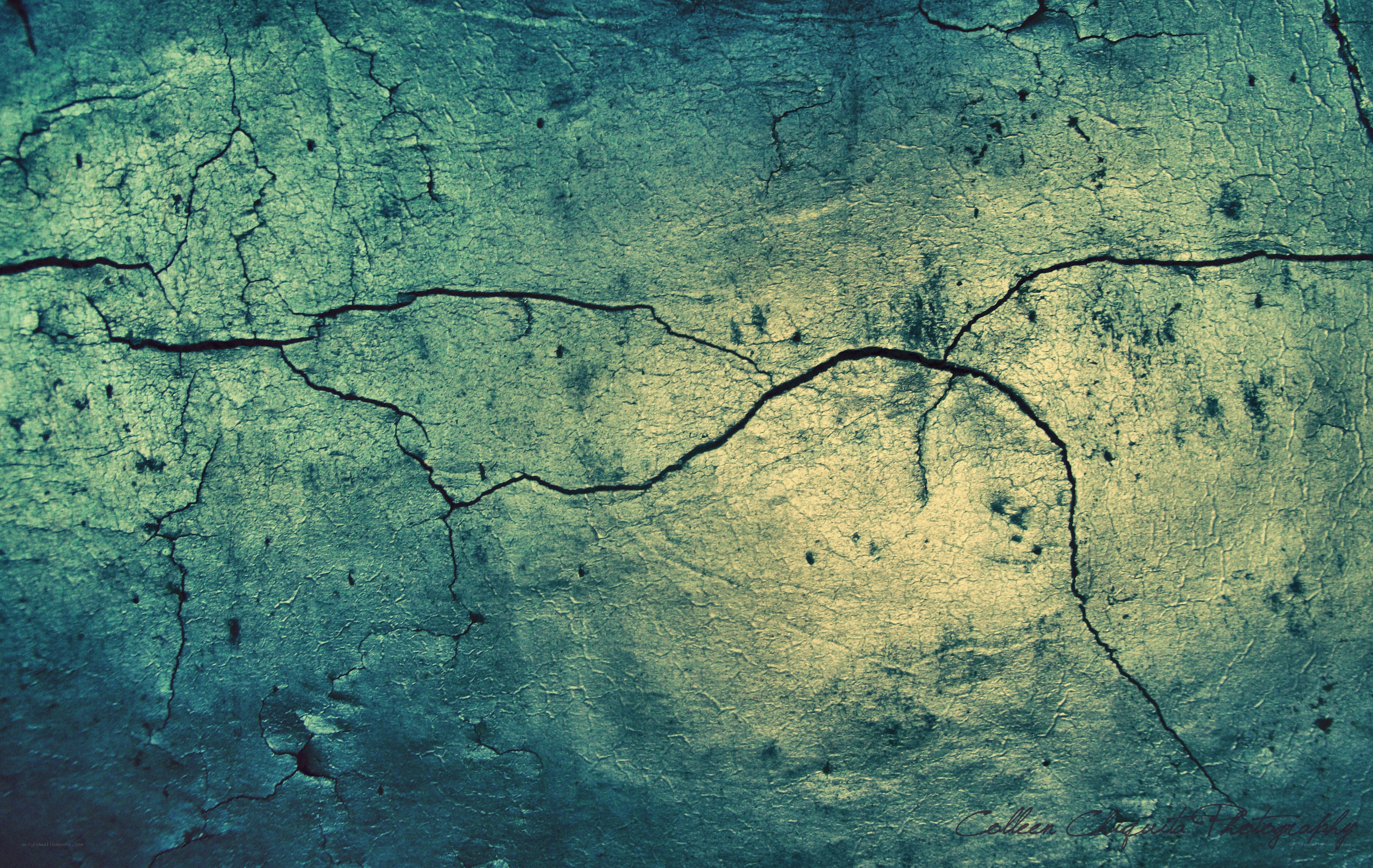 cracked teal surface texture