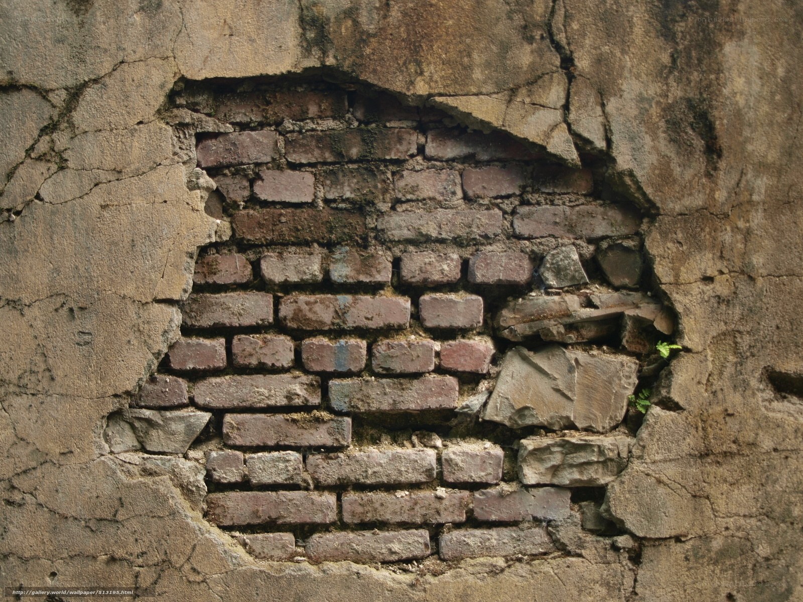 cracked wall with brick exposure