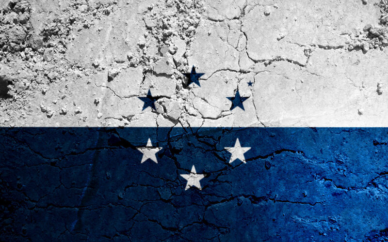 cracked wall with flag design
