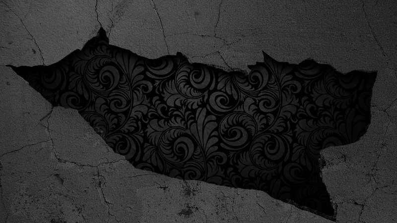 cracked wall with floral pattern