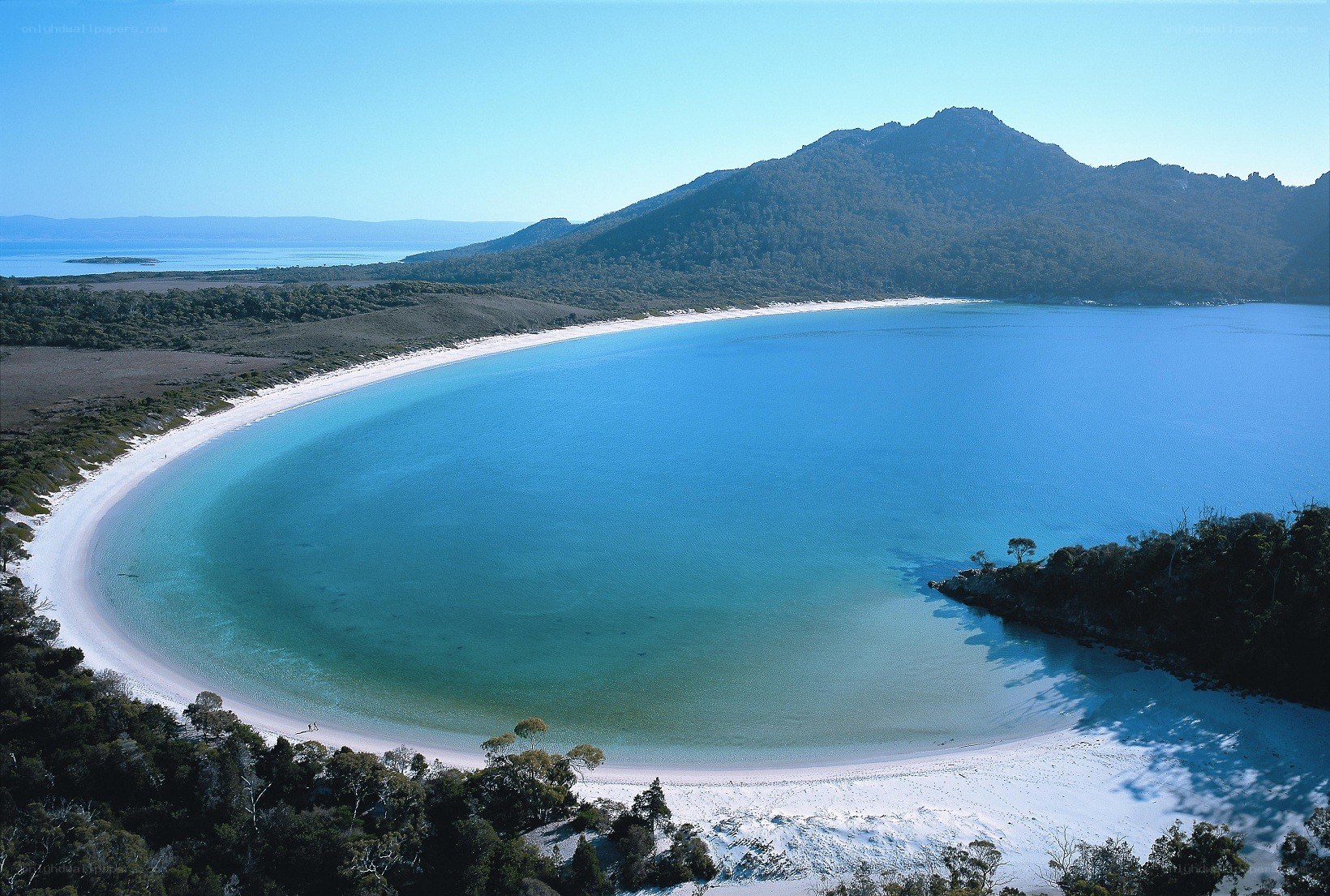 Cradle Bay beach and mountain