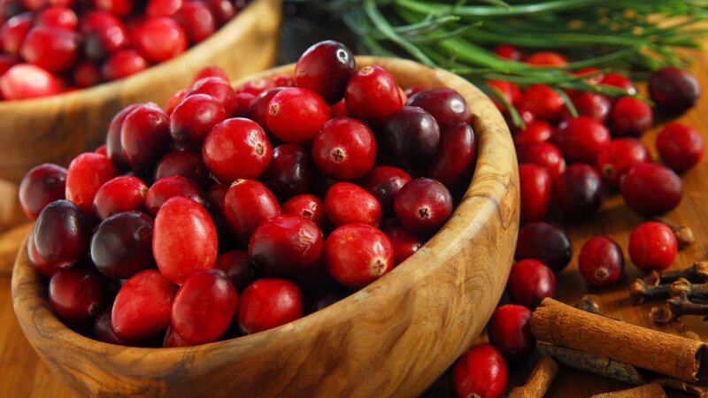Cranberries in a wooden bowl