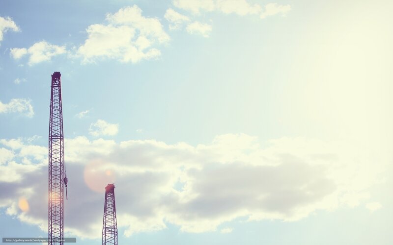 Crane against cloudy sky