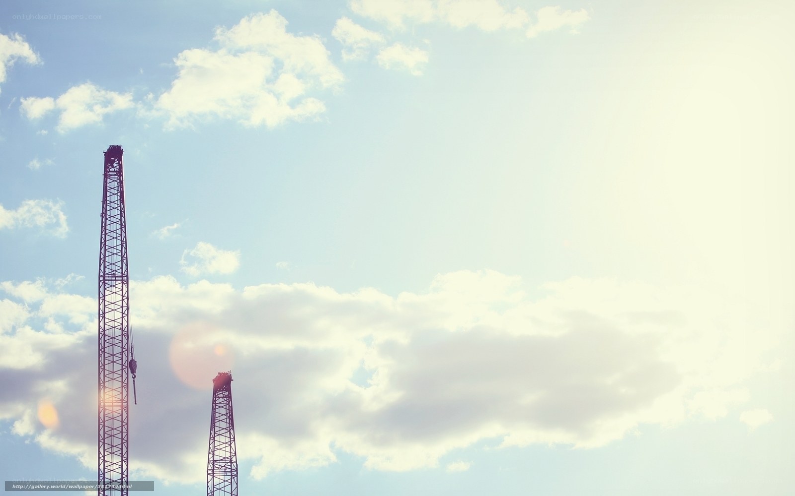Crane against cloudy sky