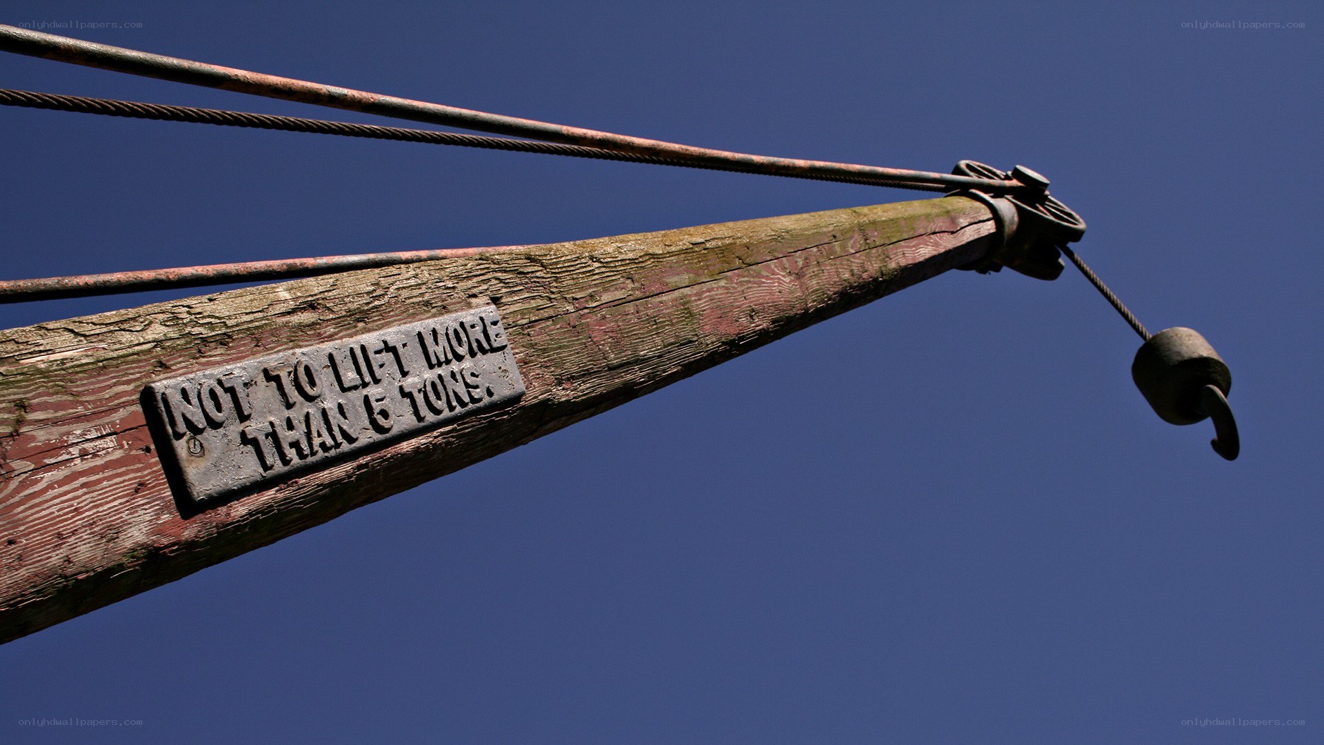 crane arm with weight limit sign