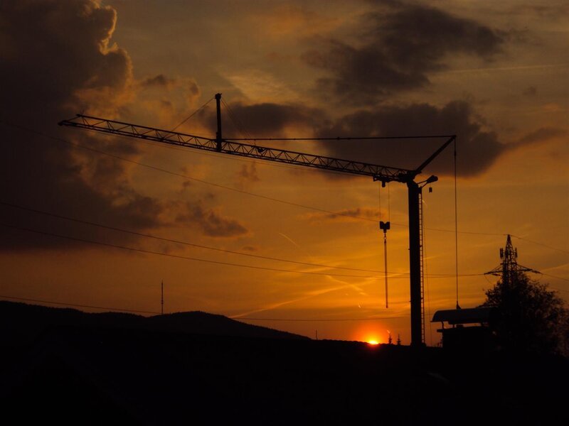 Crane at sunset silhouette