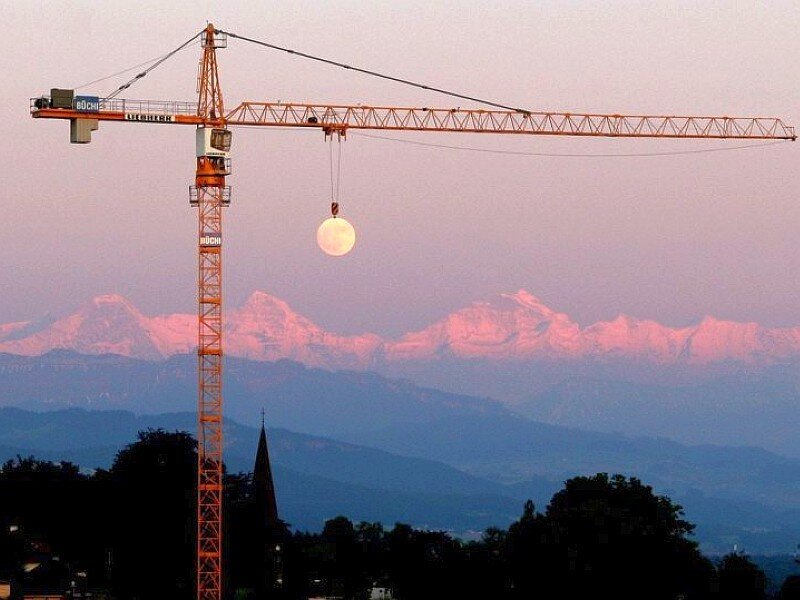 Crane with moon illusion