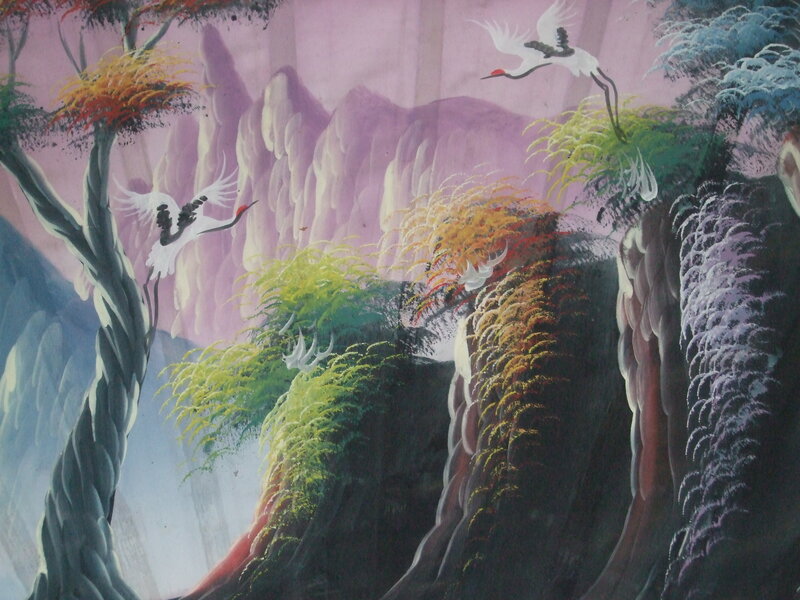 Cranes Flying over Mountains