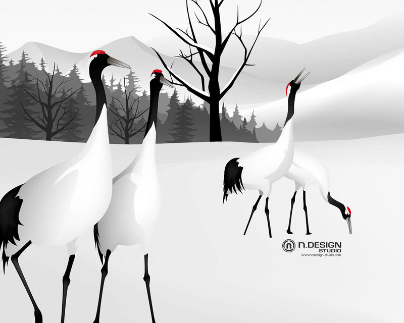 Cranes in a snowy landscape