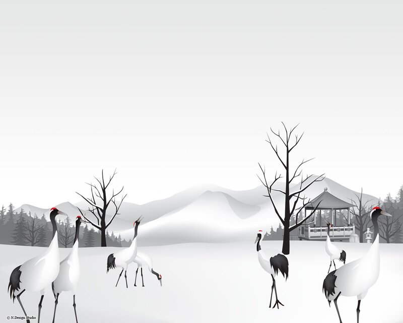 Cranes in a snowy landscape