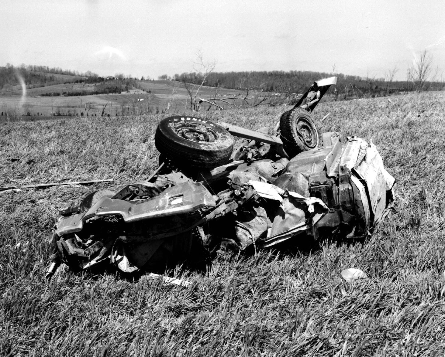 Crashed car in a field