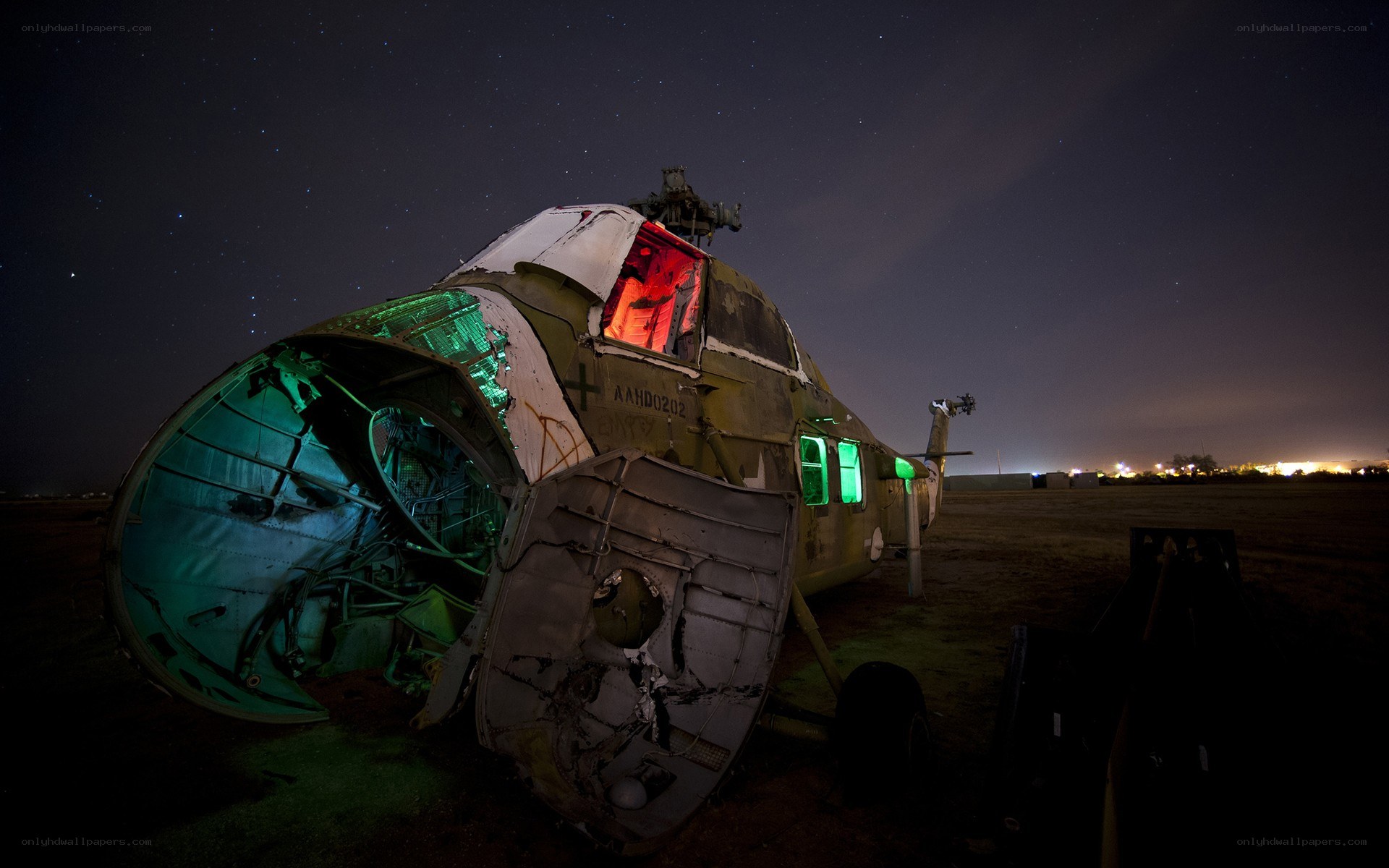 Crashed helicopter at night