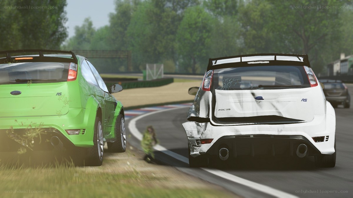 Crashed race cars on track