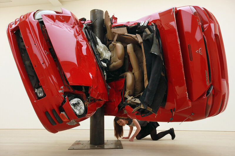 Crashed Red Car Sculpture