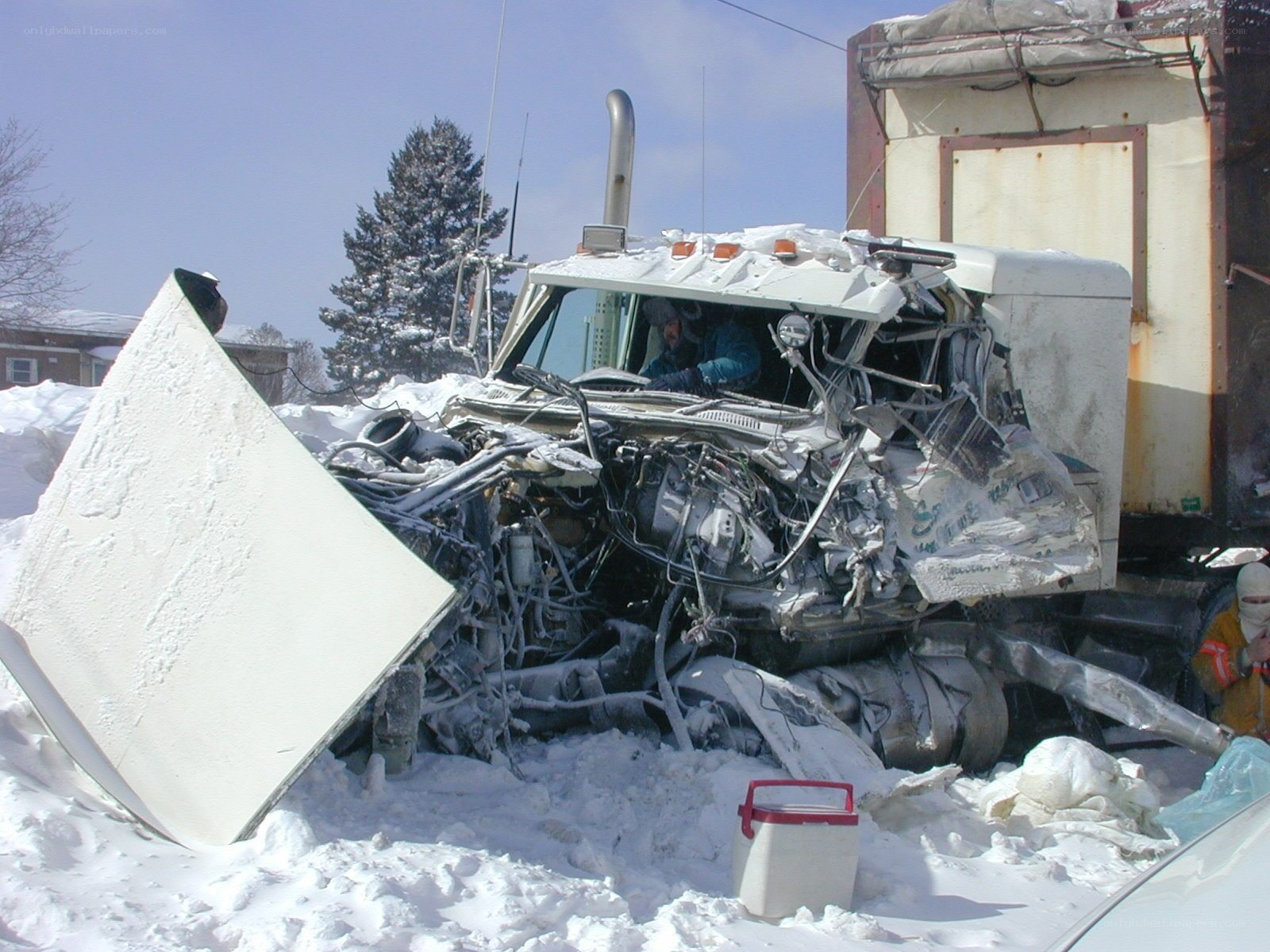Crashed truck in snow