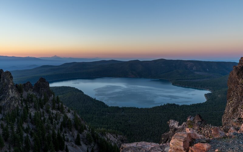Crater Lake at Dusk — Blue, Serene, Sunset, Photograph, Mountains, Forest
