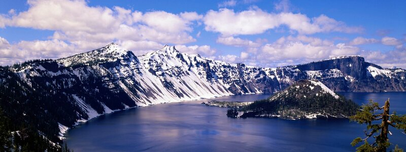 Crater Lake with snow-capped mountains