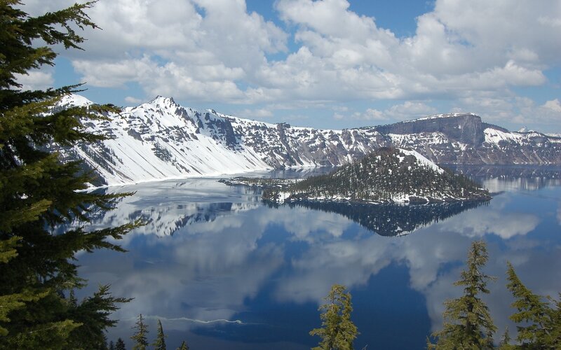 Crater Lake with snow-covered mountains