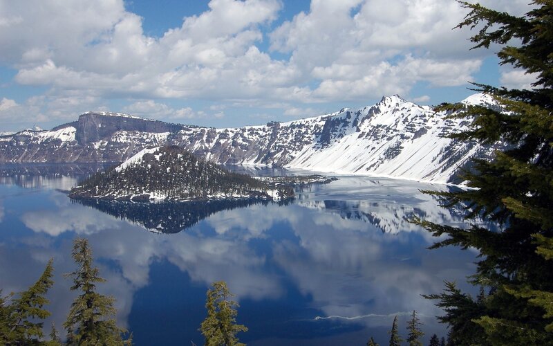 Crater Lake with snow-covered mountains