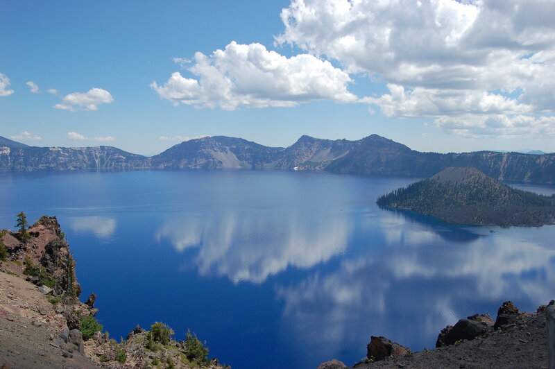 Crater Lake with Wizard Island — Blue, Serene, Afternoon, Photograph, Mountains, Clouds, White