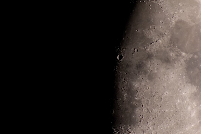 Cratered Lunar Surface — Gray, Dramatic, Photograph
