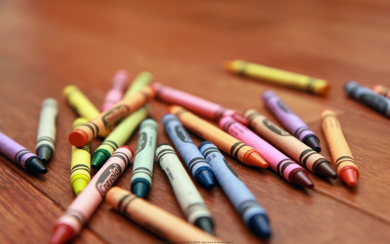 Crayons on Wooden Surface