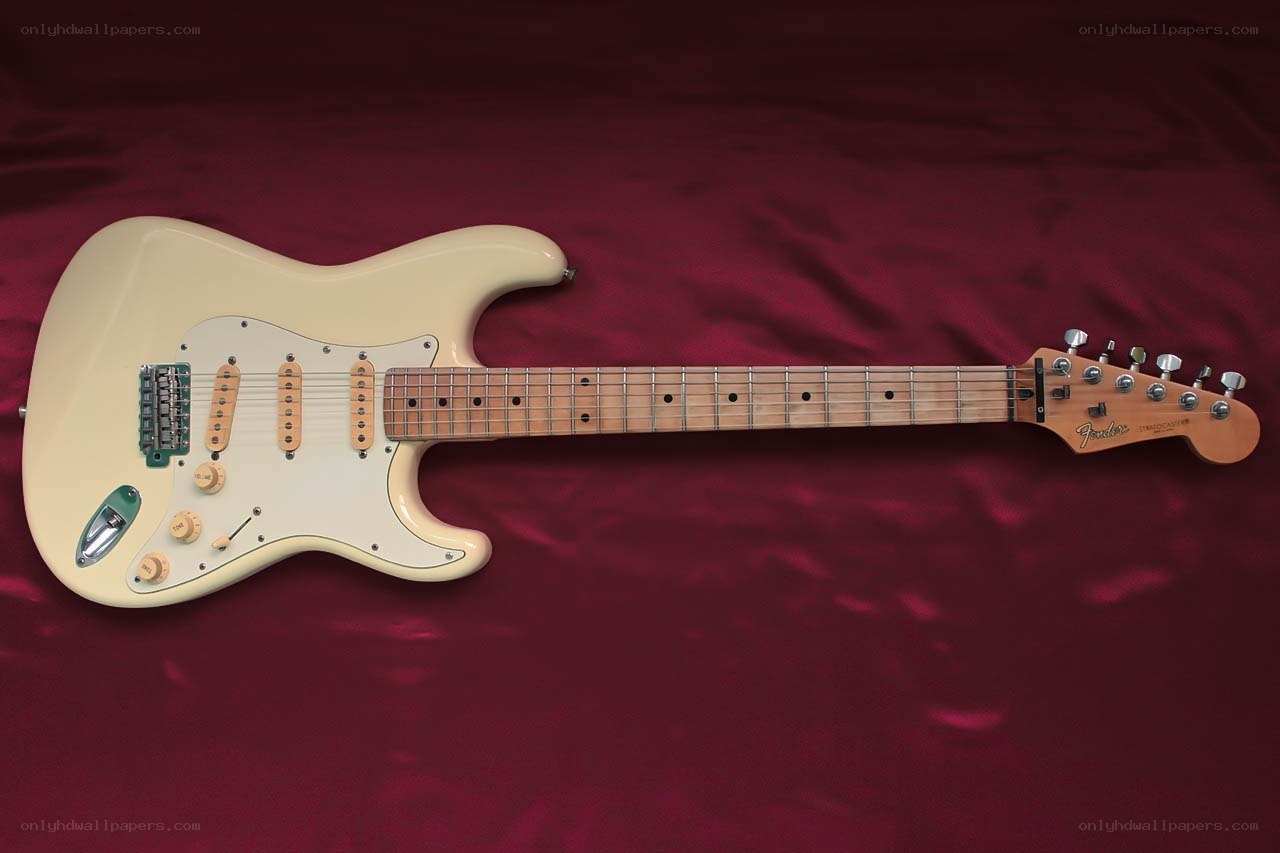 cream-colored electric guitar
