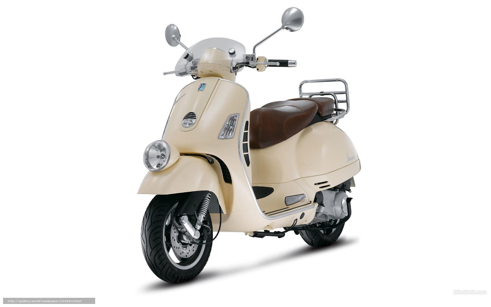 cream-colored scooter with brown seat