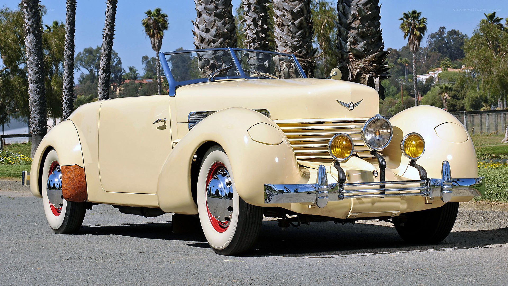 Cream convertible classic car