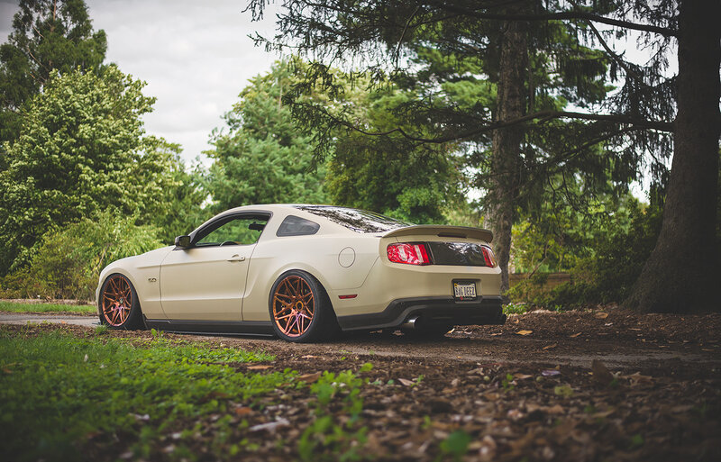 Cream Ford Mustang