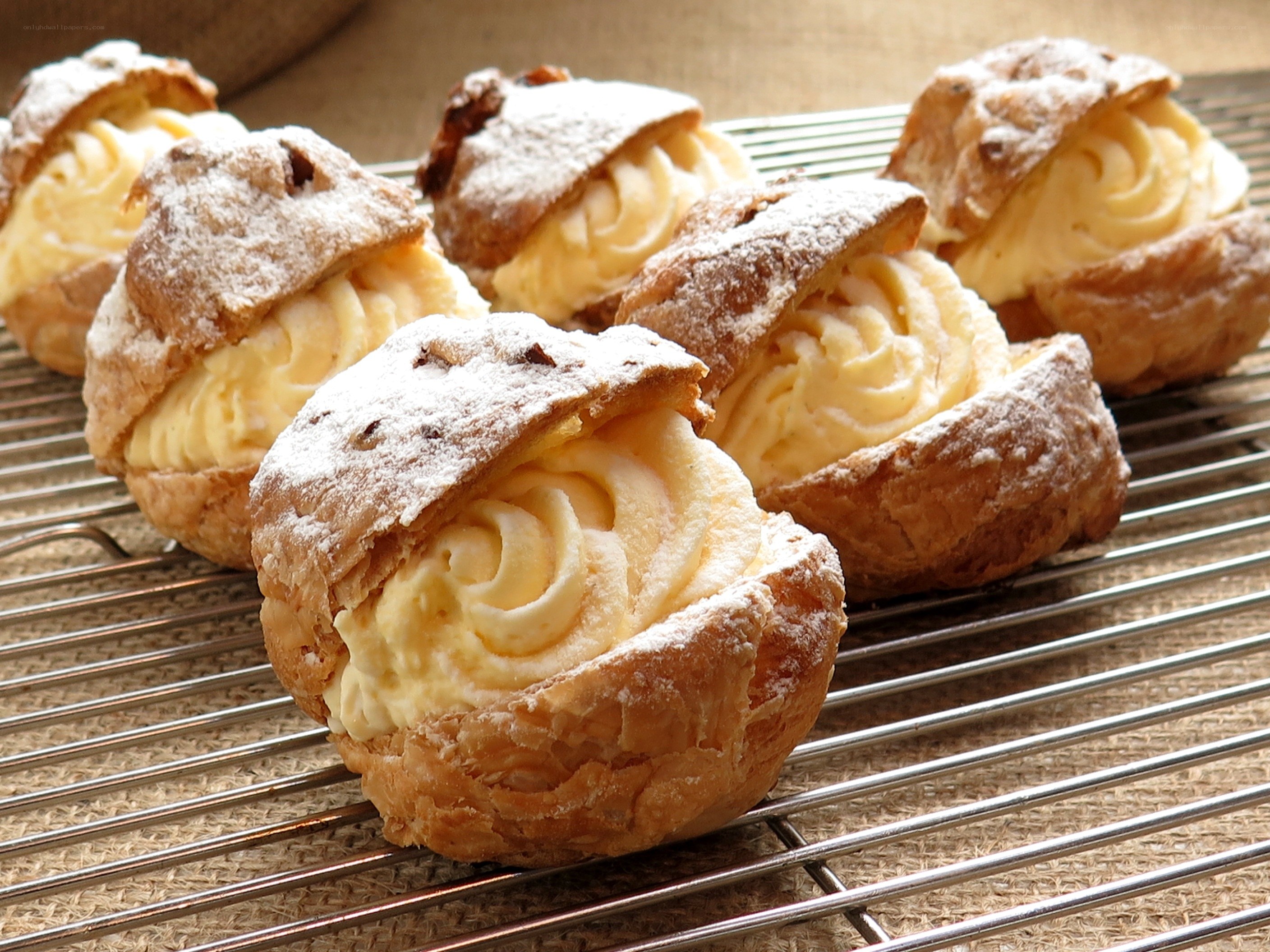 Cream puffs on a cooling rack