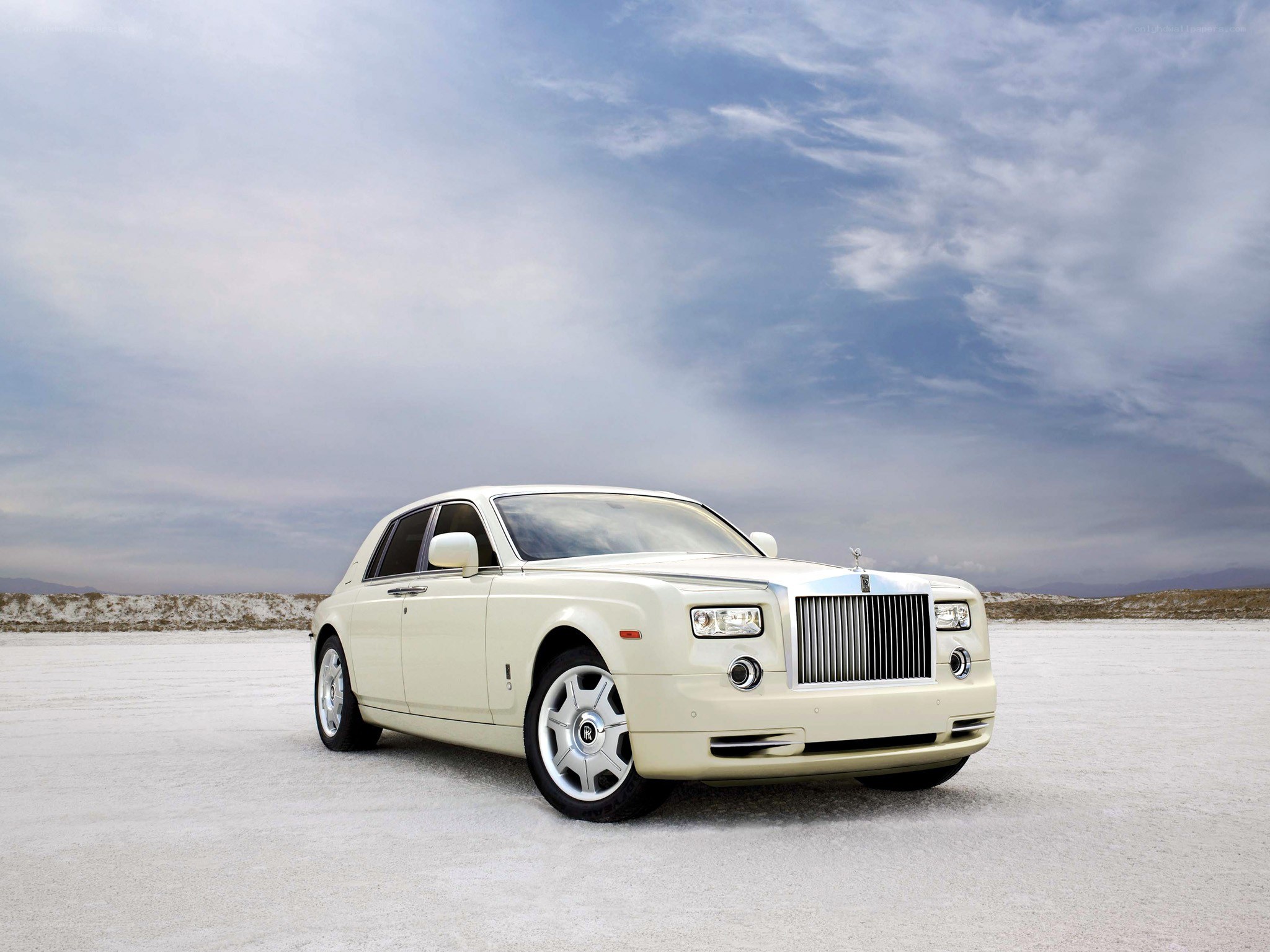 Cream Rolls-Royce on salt flat