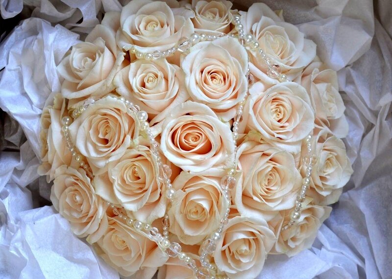 cream rose bouquet with pearls