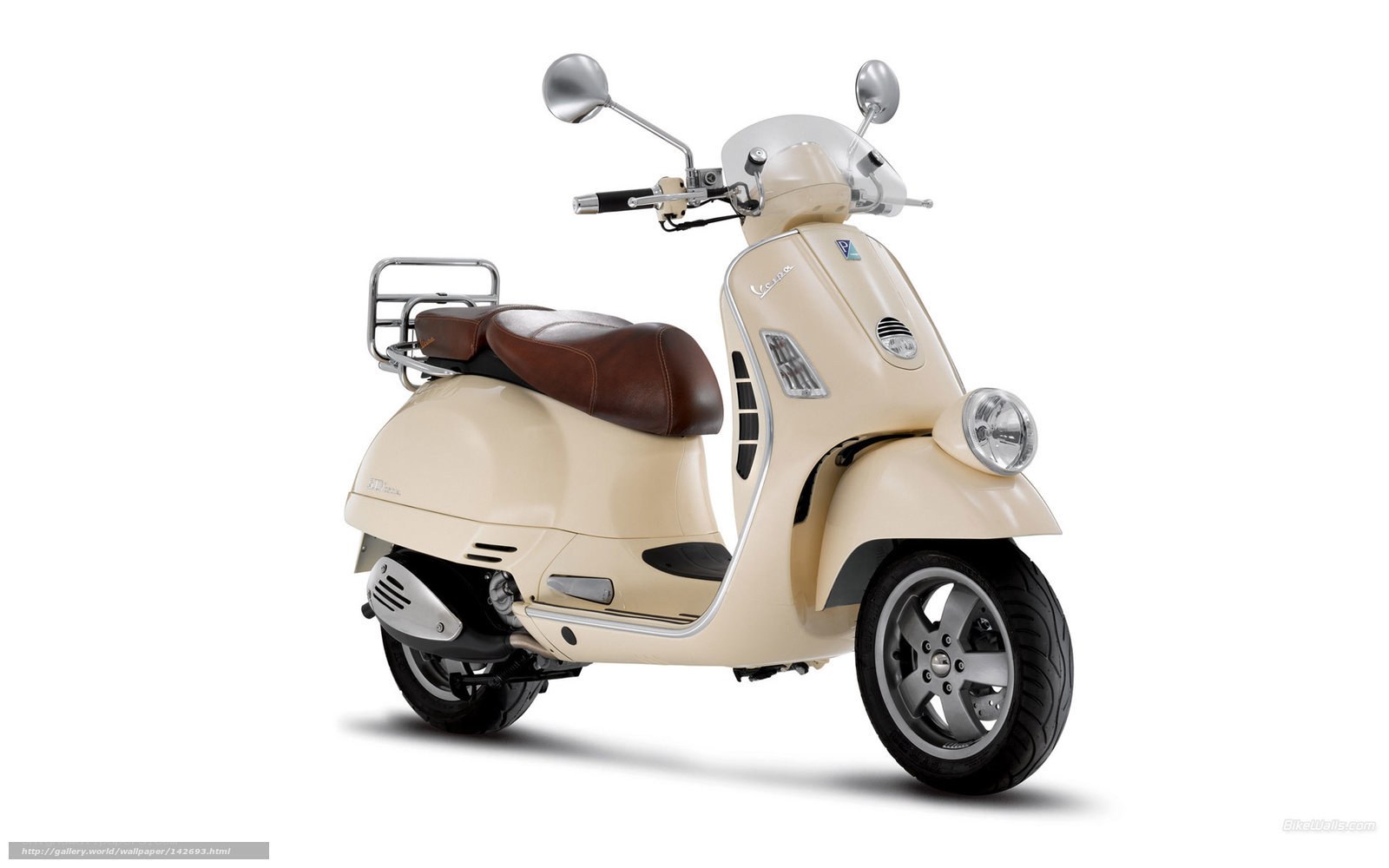cream vespa scooter