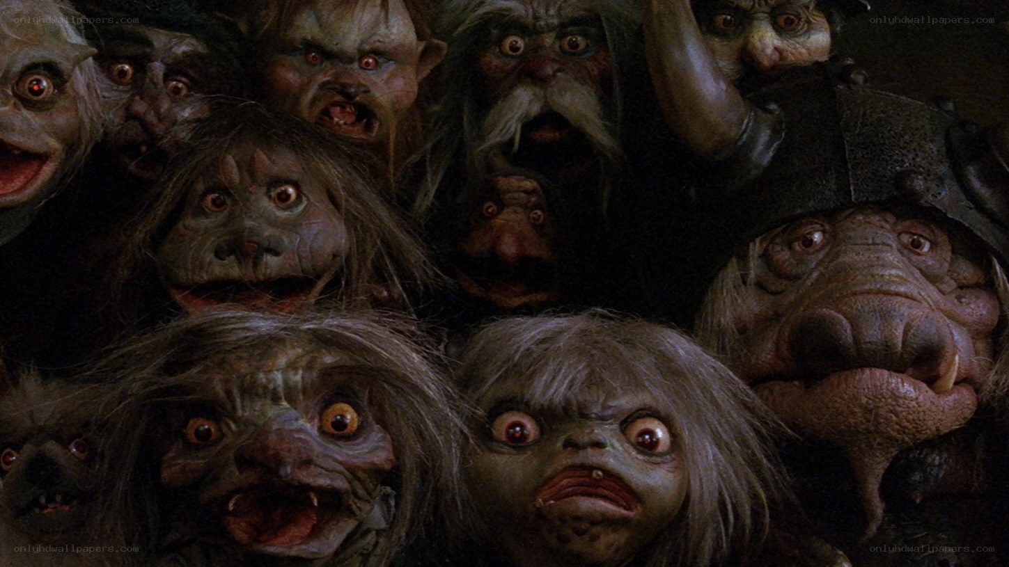 creatures in a dark crowd