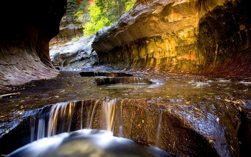 Creek Flowing Through Canyon