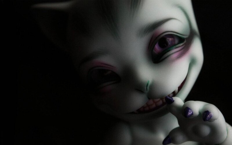 creepy cat doll in dark