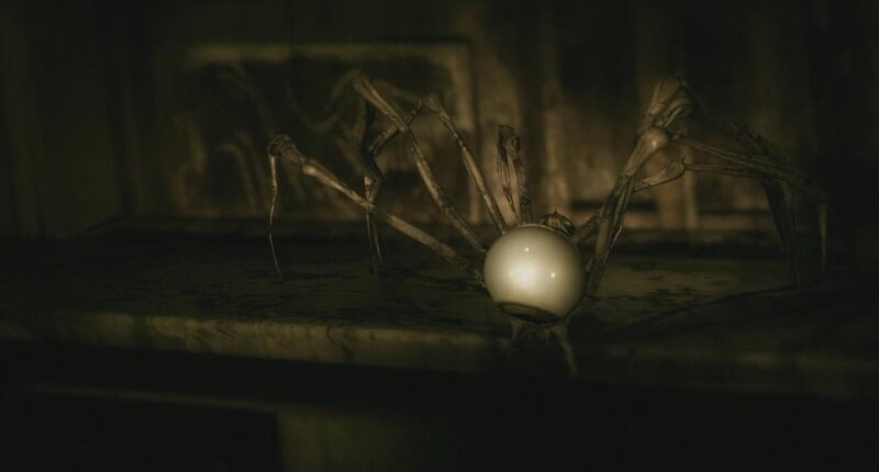 Creepy spider with glowing orb