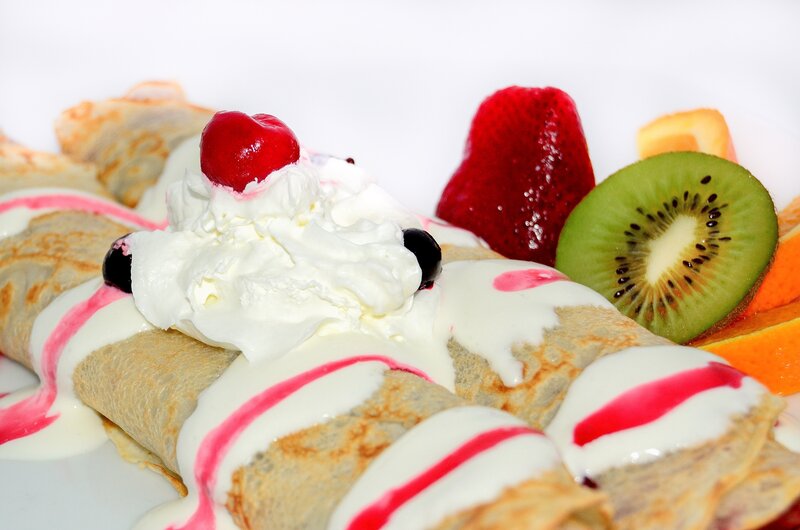 crepes with whipped cream and fruit