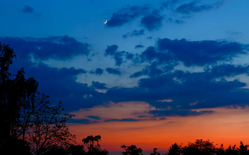Crescent moon at dusk