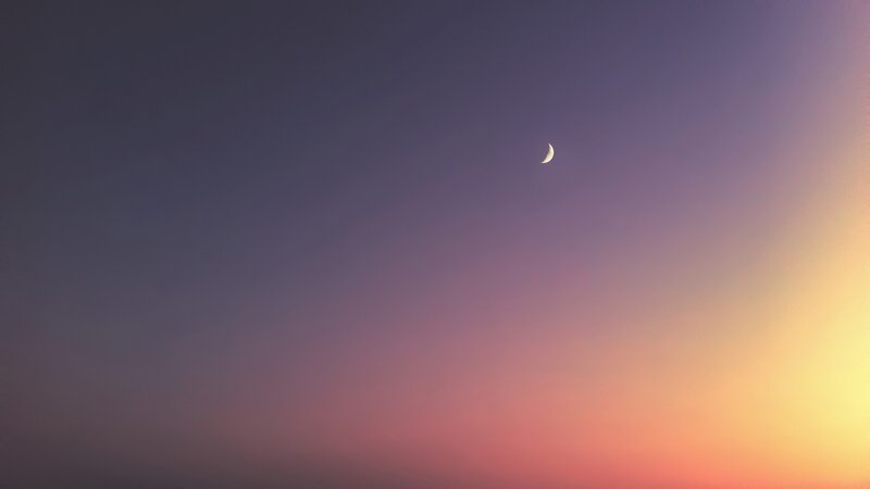 Crescent moon at sunset