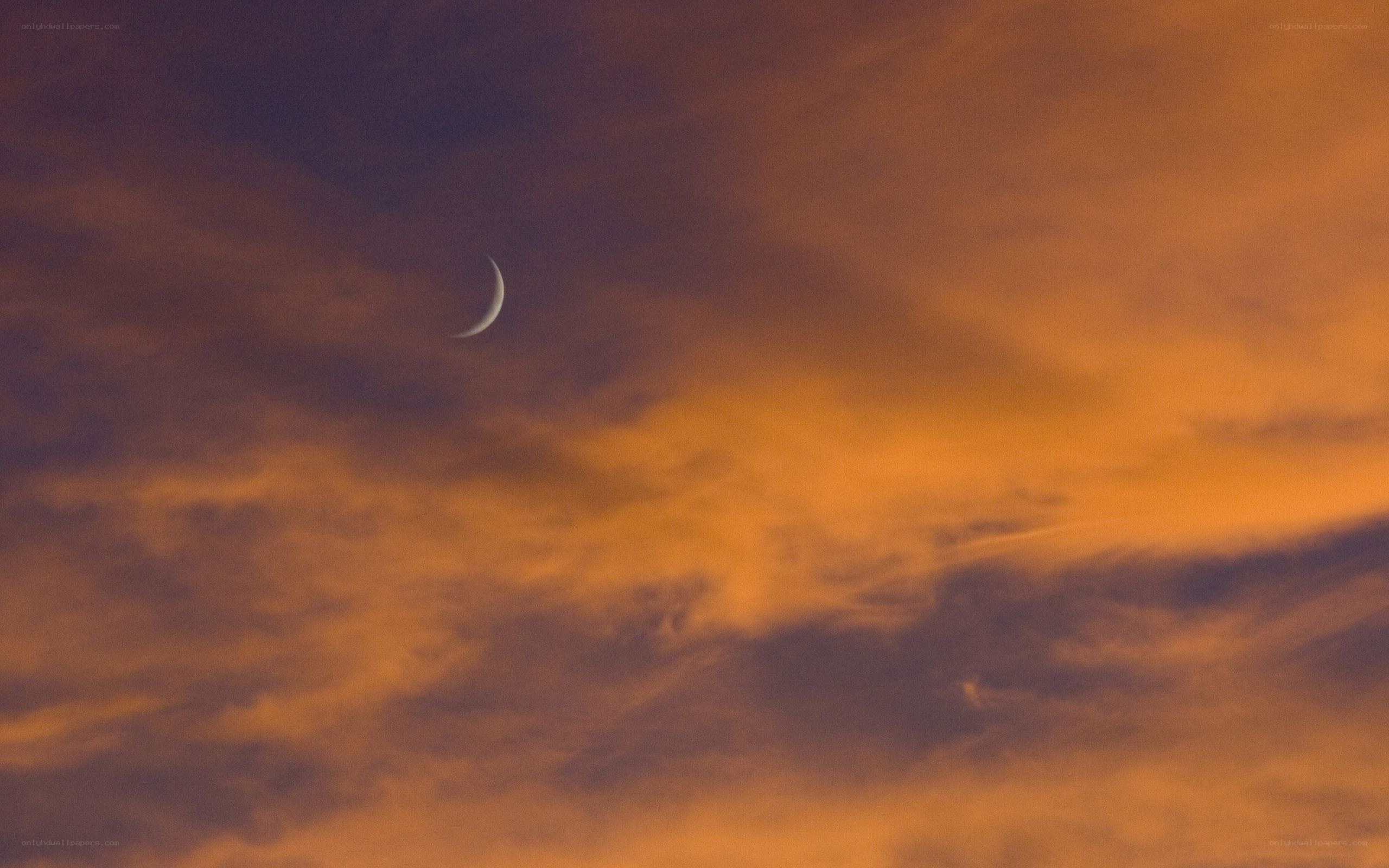 Crescent moon at sunset