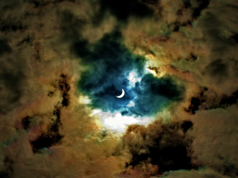 Crescent Moon in Clouds