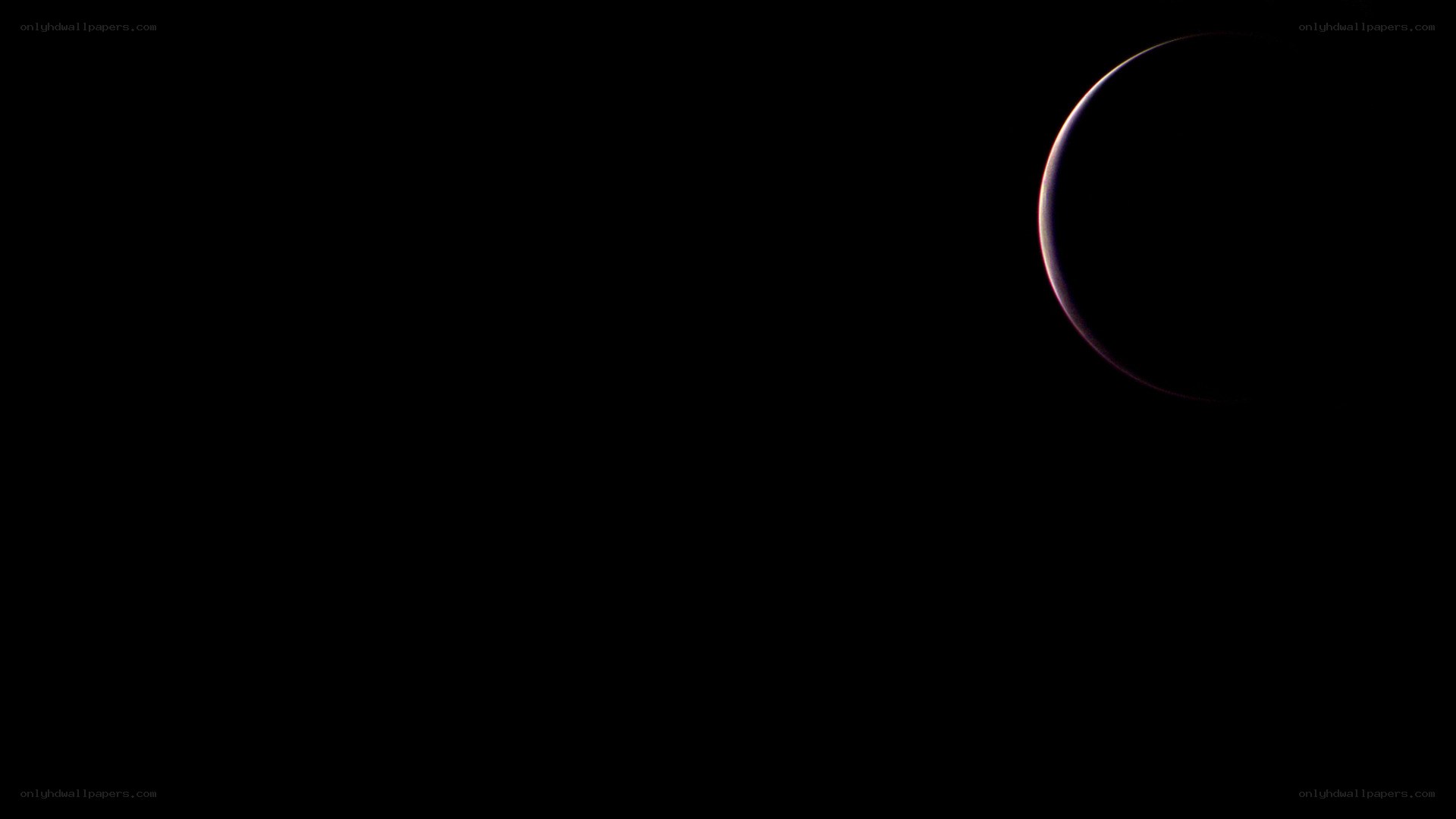 crescent moon in darkness