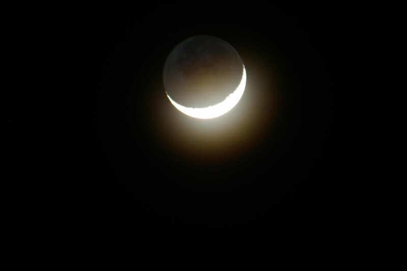 Crescent Moon in Night Sky — Black, Dramatic