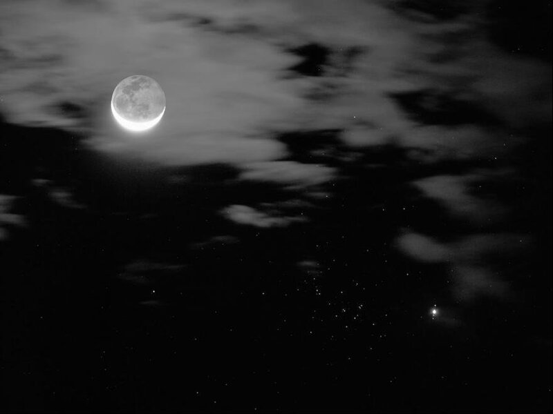 Crescent Moon in Night Sky — Black, Serene, Photograph, Clouds, Stars