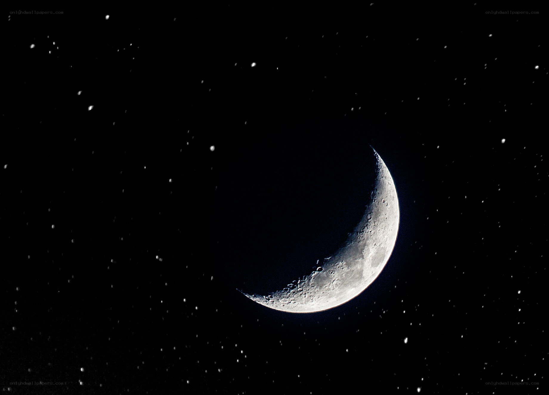 Crescent moon in starry sky