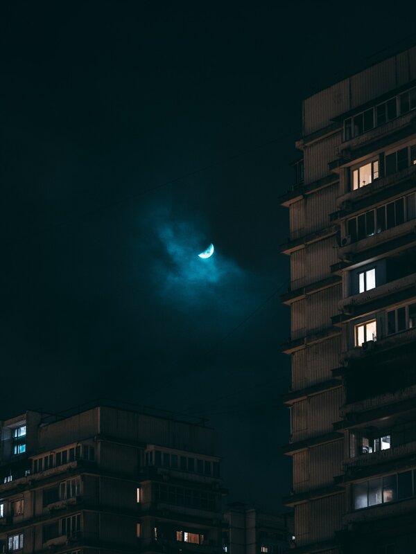 Crescent Moon over Buildings