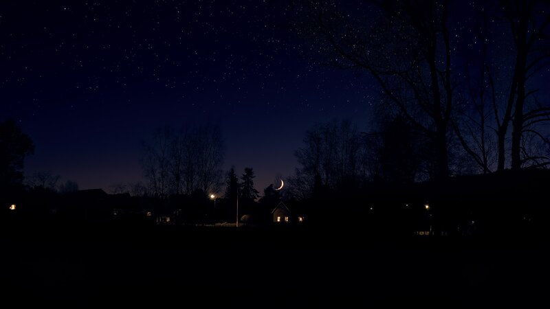 Crescent Moon over Houses